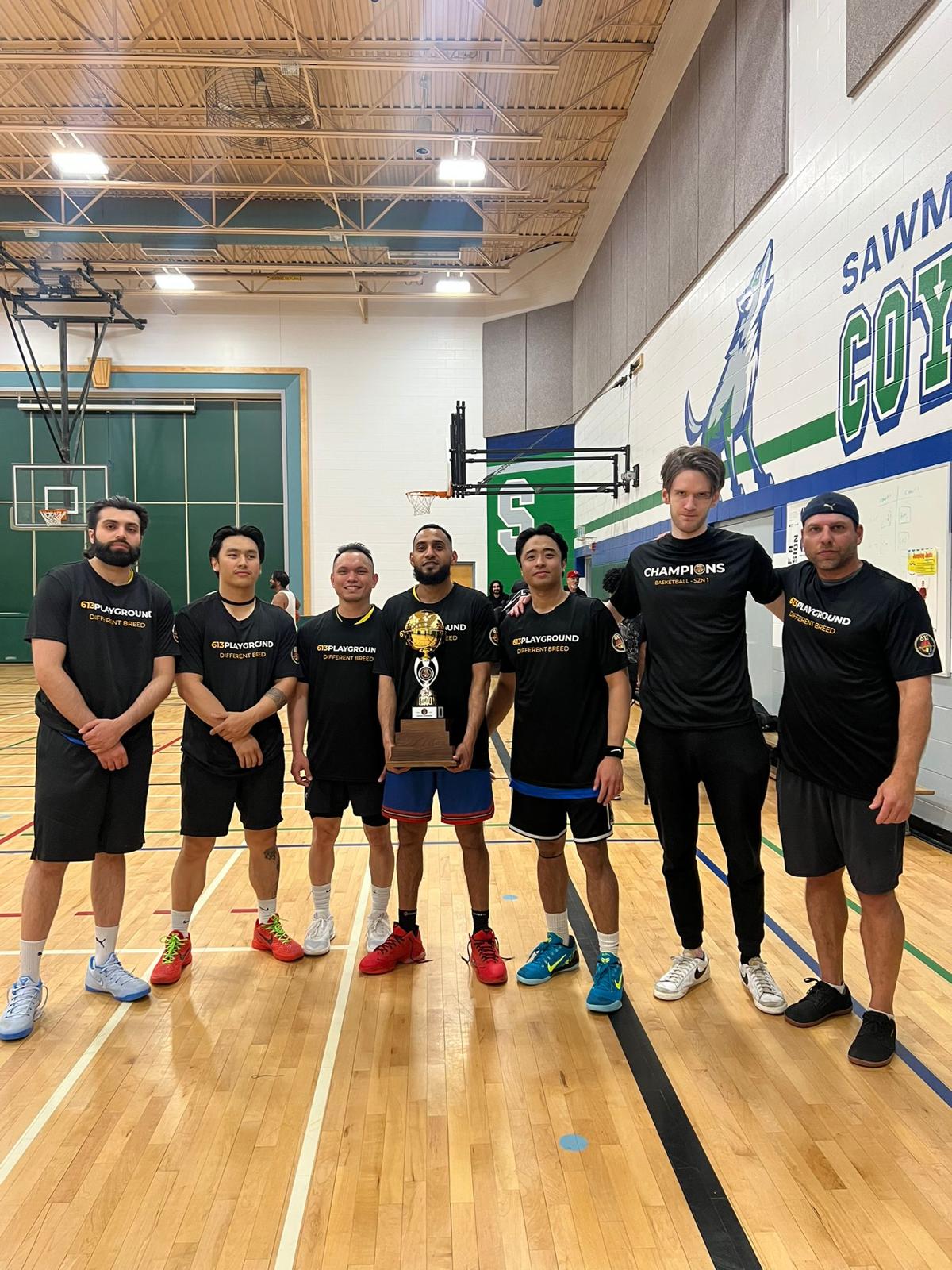 613 Playground players with the championship trophy